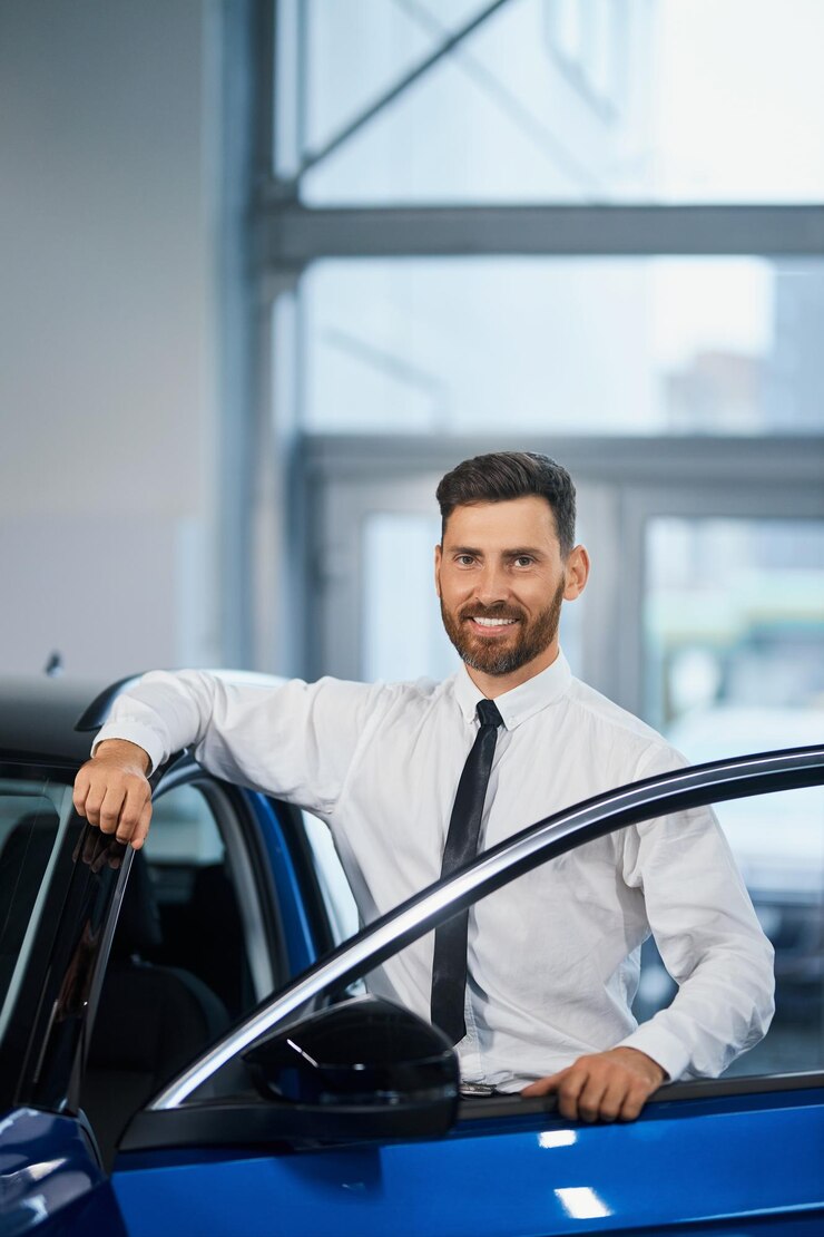 Businessman Standing Auto Salon Smiling Camera 7502 9589